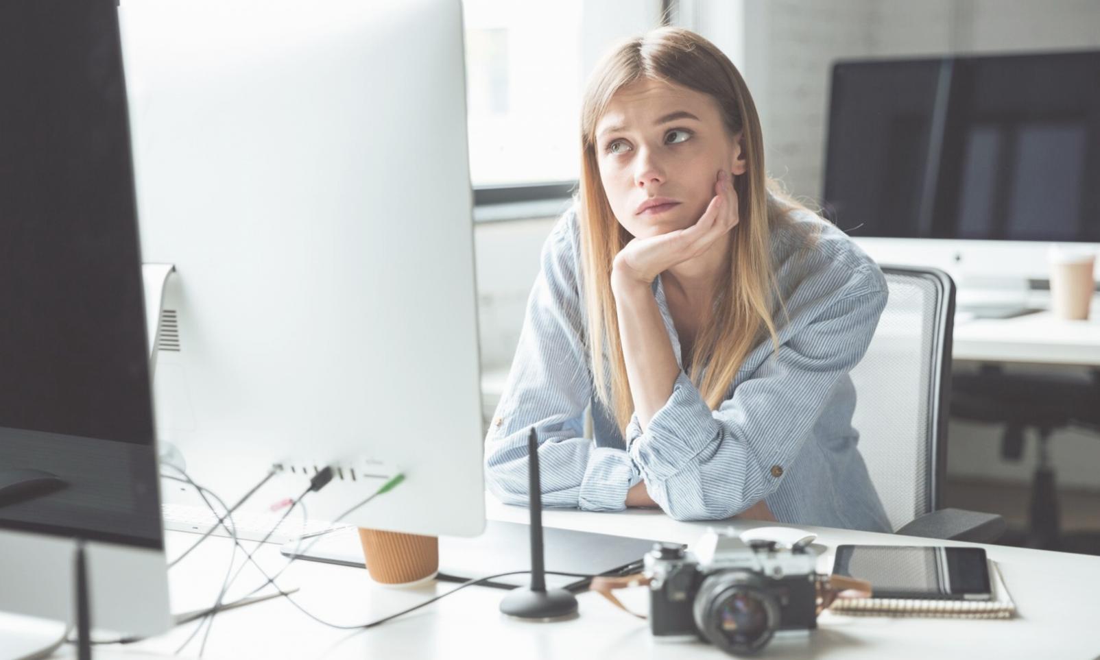 Information security professional reviewing network diagrams
